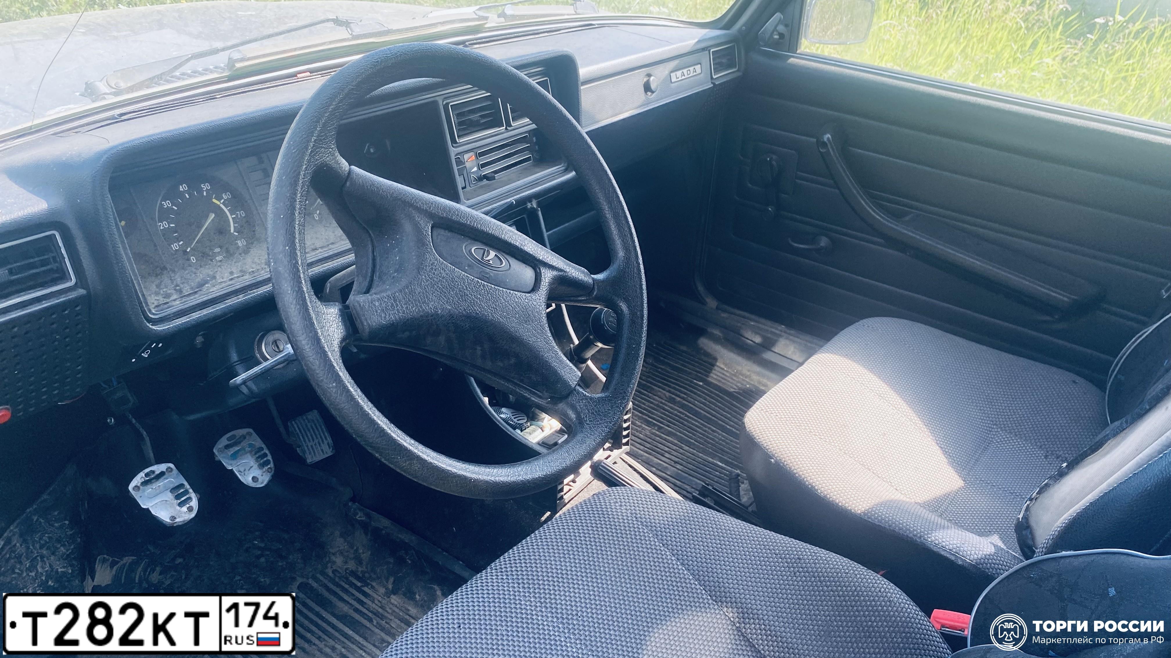 Фото автомобиля LADA 2107, 2010 — госномер Т282КТ174. Цвет: СЕРО-ЗЕЛЕНЫЙ