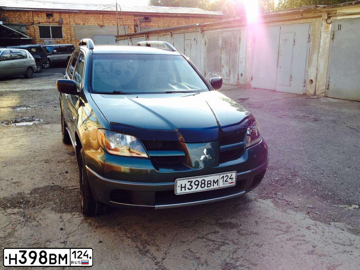 Фото автомобиля MITSUBISHI OUTLANDER, 2003 — госномер М081НЕ124. Цвет: СЕРО ЗЕЛЕНЫЙ