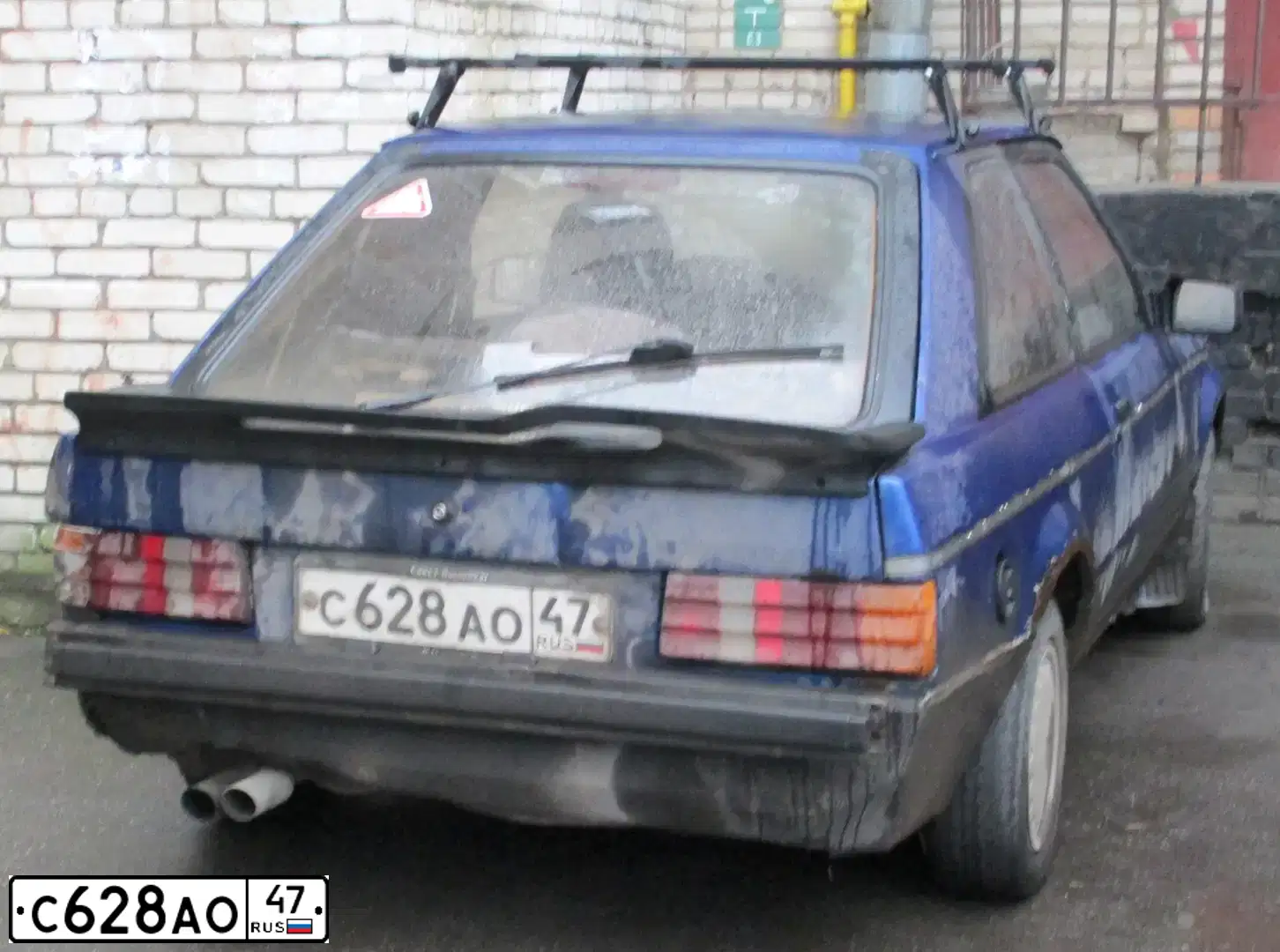 Фото автомобиля FORD ESCORT, 1983 — госномер С628АО47. Цвет: СИНИЙ