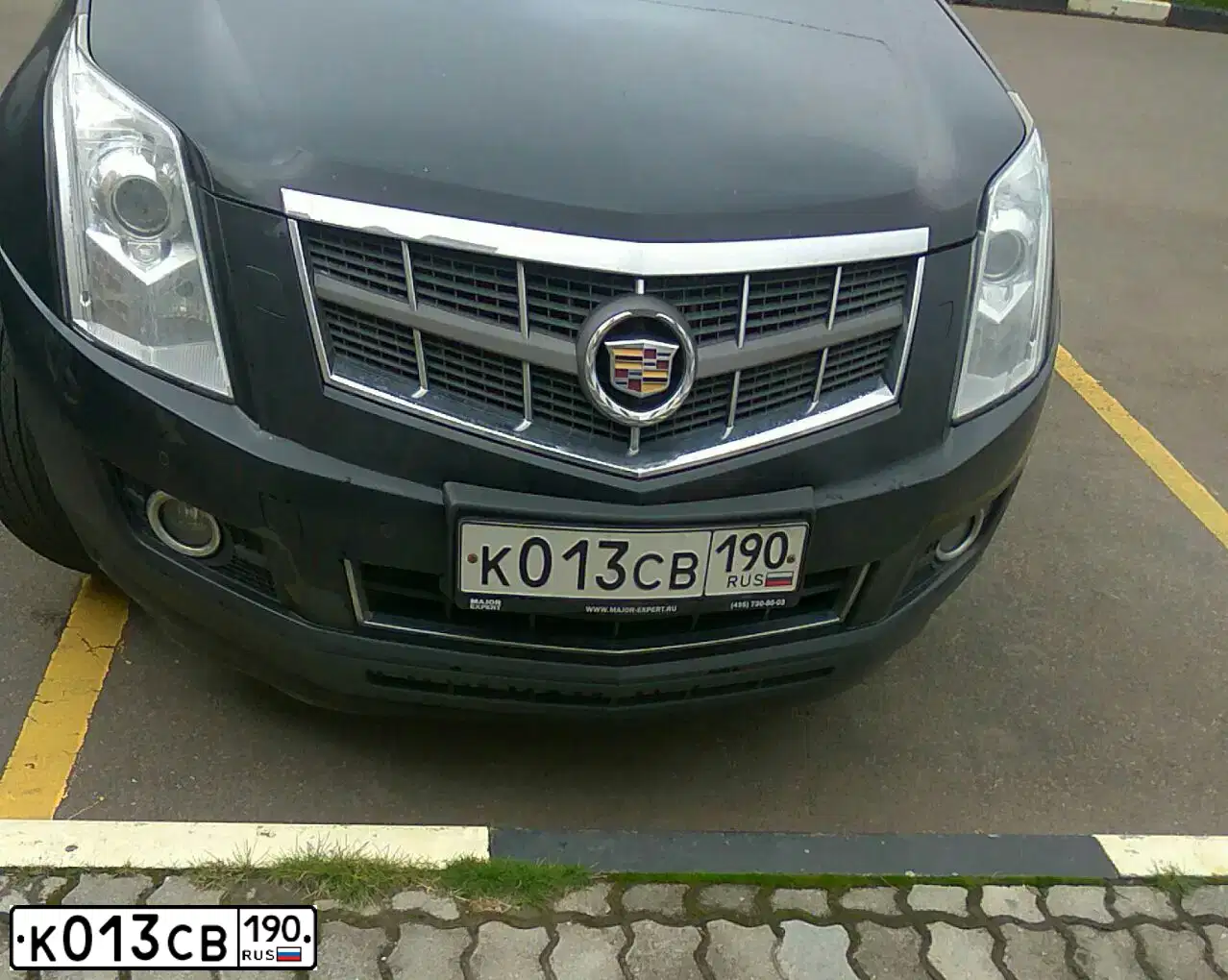 Фото автомобиля CADILLAC SRX, 2011 — госномер С572РН33. Цвет: ЧЕРНЫЙ