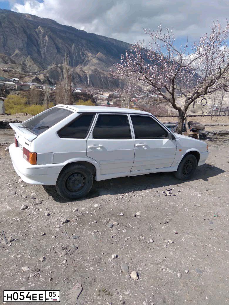 Фото автомобиля LADA 2114 SAMARA, 2012 — госномер Н054ЕЕ05. Цвет: Белый