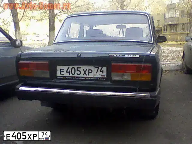Фото автомобиля LADA 2107, 2006 — госномер Е405ХР74. Цвет: ТЕМНО-ЗЕЛЕНЫЙ