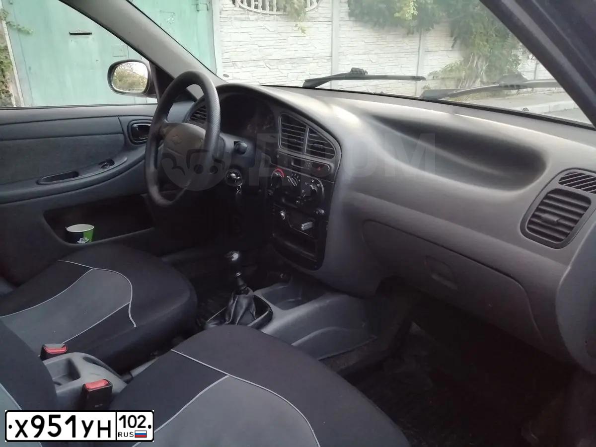 Фото автомобиля CHEVROLET LANOS, 2008 — госномер В034КР92. Цвет: ЧЕРНЫЙ