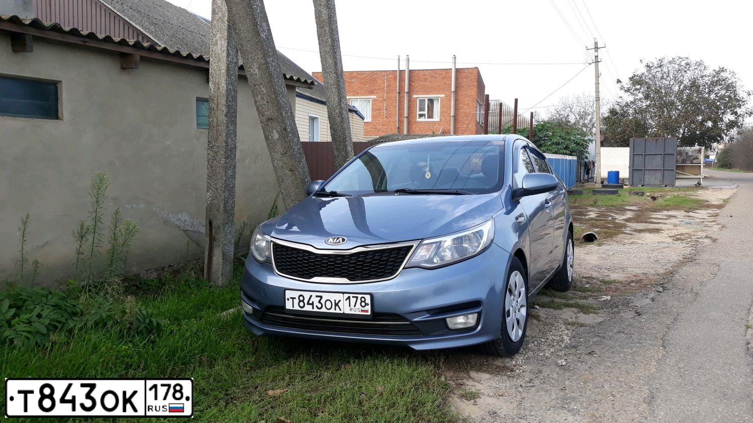 Фото автомобиля KIA RIO, 2016 — госномер М355АС193. Цвет: голубой