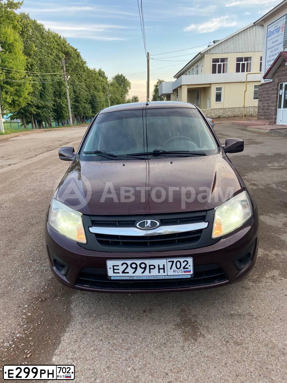 Фото автомобиля LADA 2190 GRANTA, 2012 — госномер Е299РН702. Цвет: ТЕМНО-ВИШНЕВЫЙ