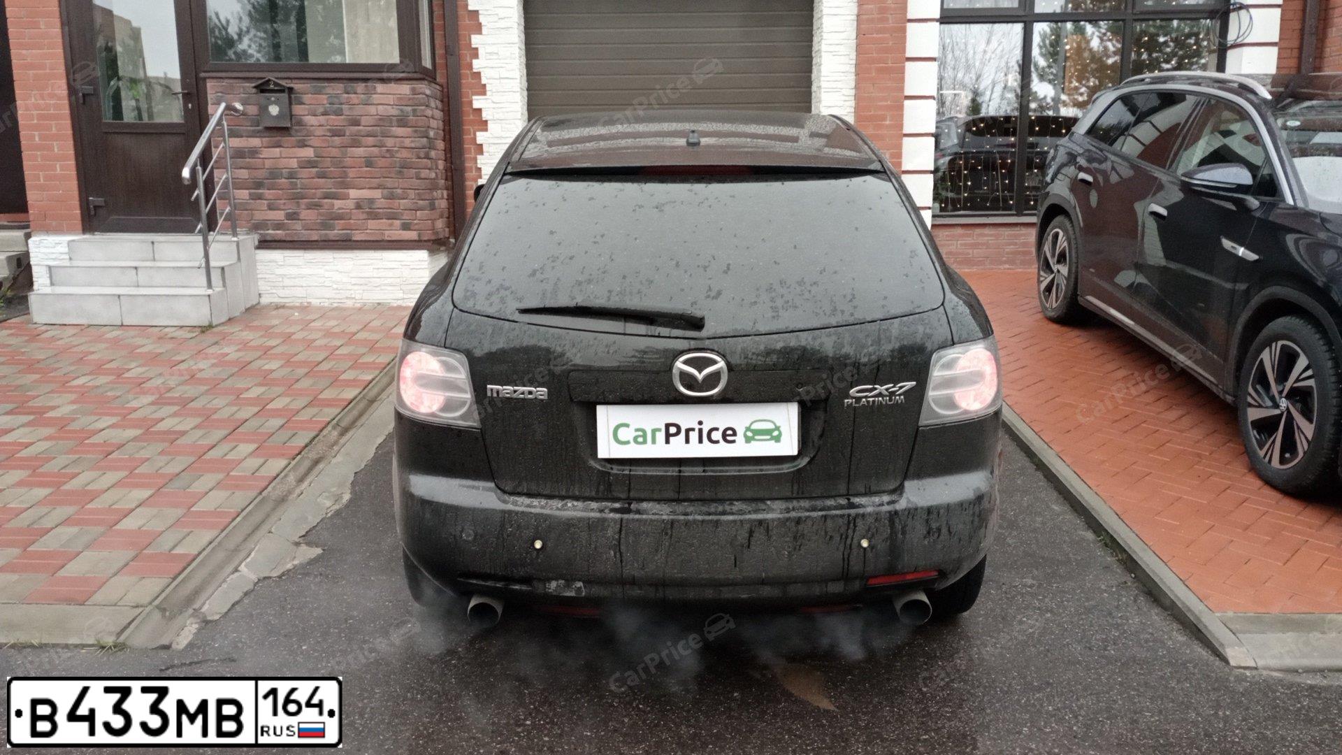 Фото автомобиля MAZDA CX-7, 2007 — госномер Р110АЕ550. Цвет: ЧЕРНЫЙ