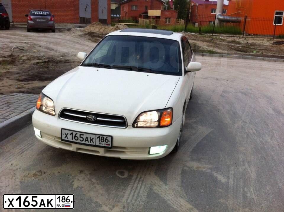 Фото автомобиля SUBARU OUTBACK, 2000 — госномер В383МС122. Цвет: Белый