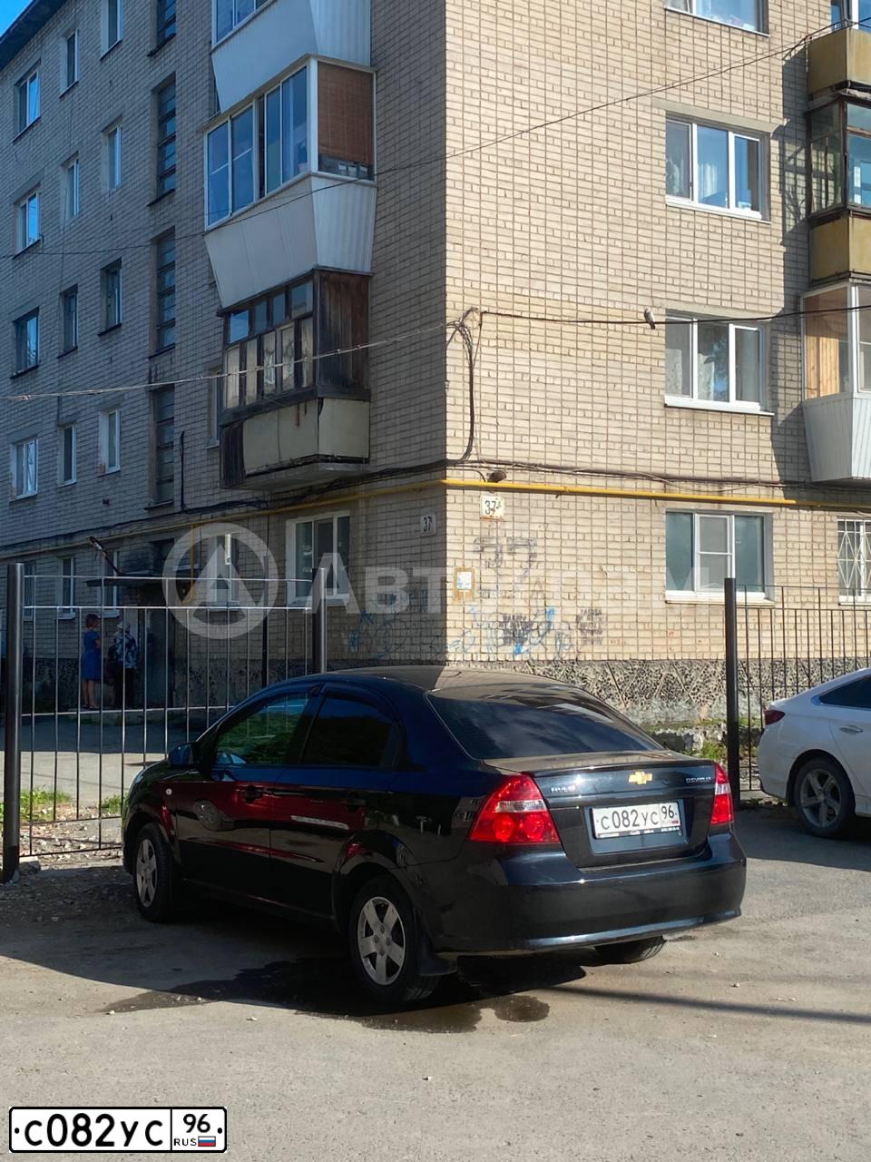 Фото автомобиля CHEVROLET AVEO, 2011 — госномер С082УС96. Цвет: ЧЕРНЫЙ