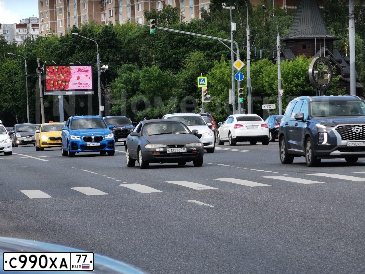 Фото автомобиля LADA 2109 SAMARA, 1998 — госномер С990ХА77. Цвет: Сине-зеленый