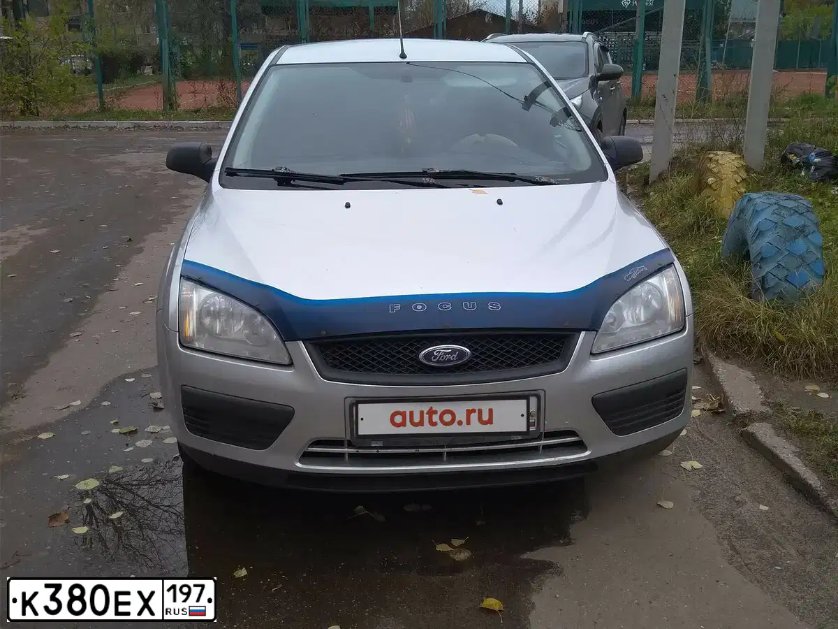 Фото автомобиля FORD FOCUS, 2006 — госномер О571ОН44. Цвет: СЕРЕБРИСТЫЙ