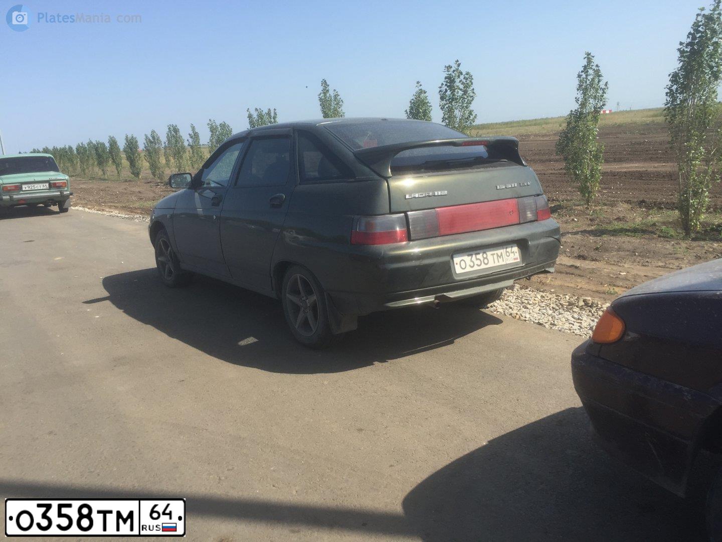 Фото автомобиля LADA 2112, 2004 — госномер Р606ВК64. Цвет: ТЕМНО ЗЕЛЕНЫЙ