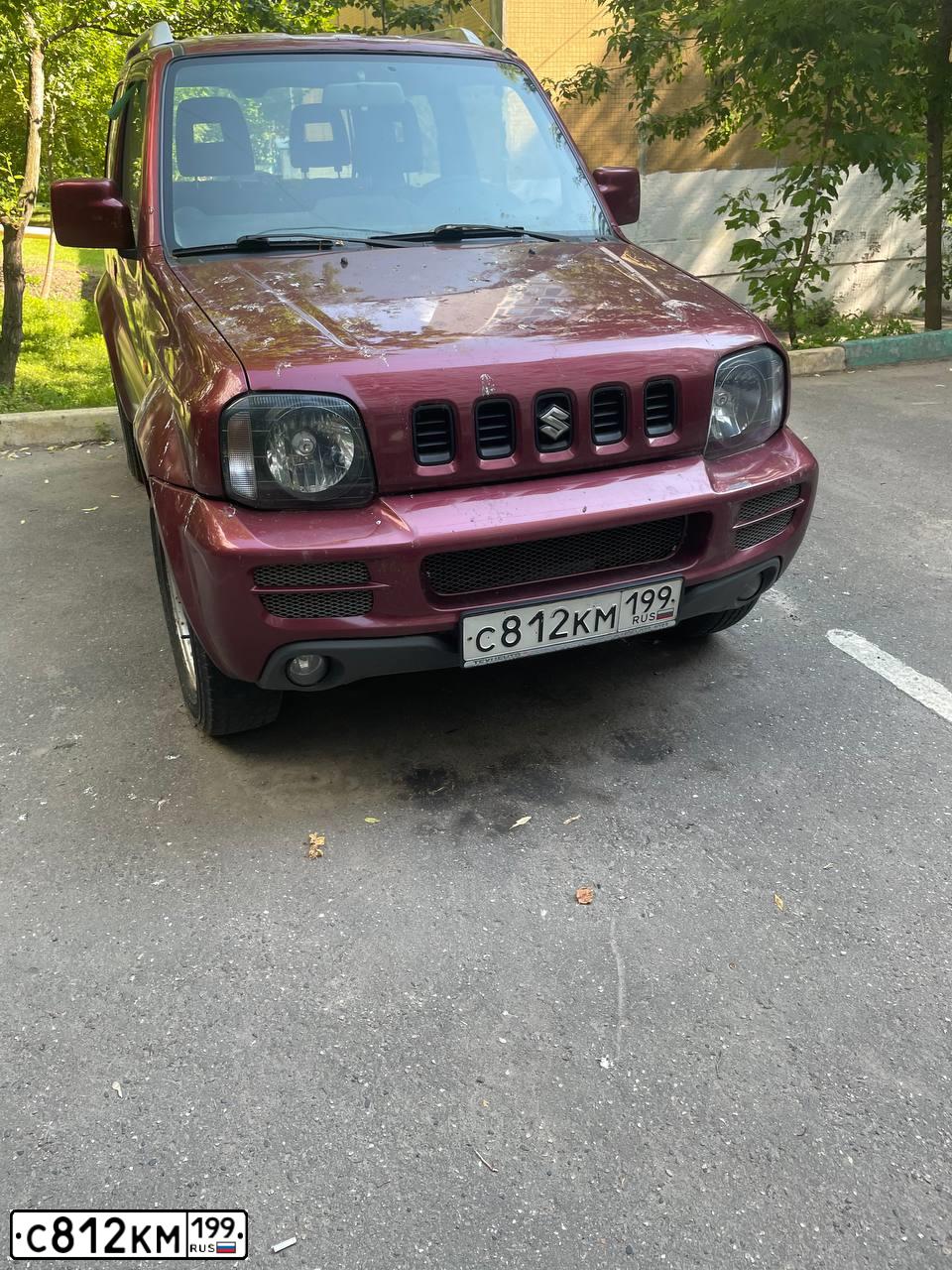 Фото автомобиля SUZUKI JIMNY, 2008 — госномер Т687РУ797. Цвет: Красный