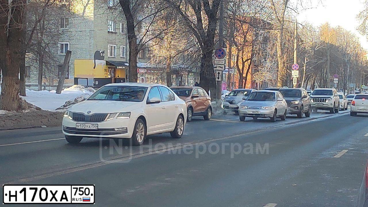Фото автомобиля FORD D FOCUS, 2009 — госномер Н170ХА750. Цвет: ЧЕРНЫЙ
