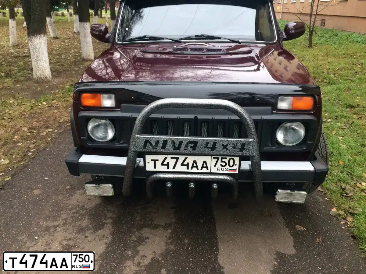 Фото автомобиля LADA 2121 NIVA, 2010 — госномер Т474АА750. Цвет: ВИШНЕВЫЙ ТЕМНЫЙ