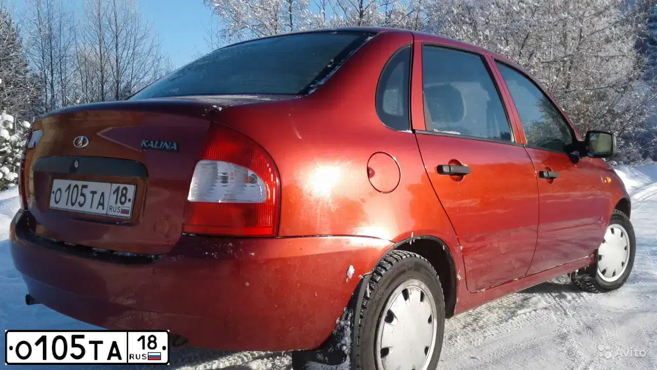 Фото автомобиля LADA KALINA, 2010 — госномер Е617ВУ18. Цвет: СЕРЕБРИСТО-КРАСНЫЙ