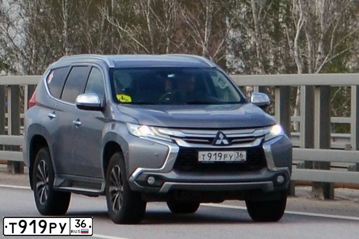 Фото автомобиля MITSUBISHI PAJERO SPORT, 2016 — госномер Т919РУ36. Цвет: СЕРЫЙ