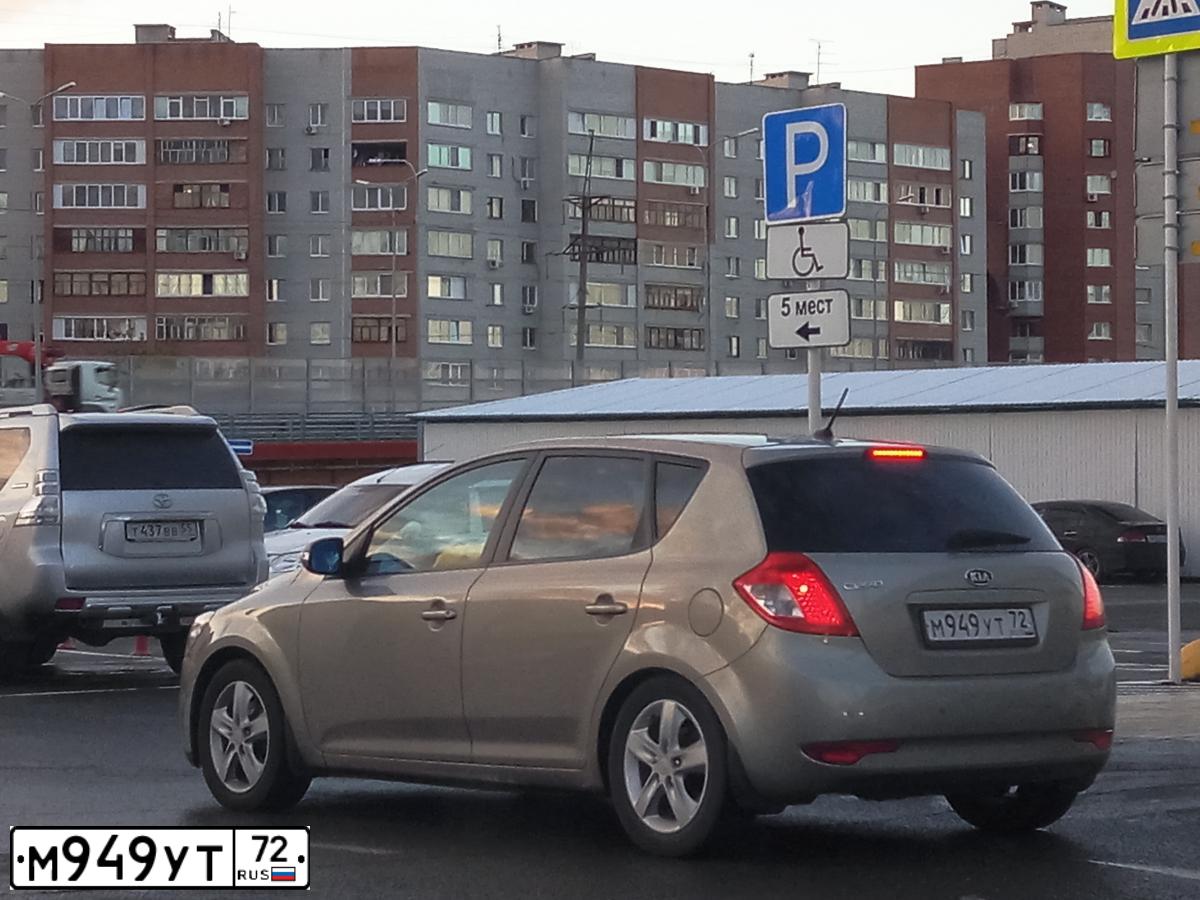 Фото автомобиля CHEVROLET AVEO, 2010 — госномер М949УТ72. Цвет: Красный
