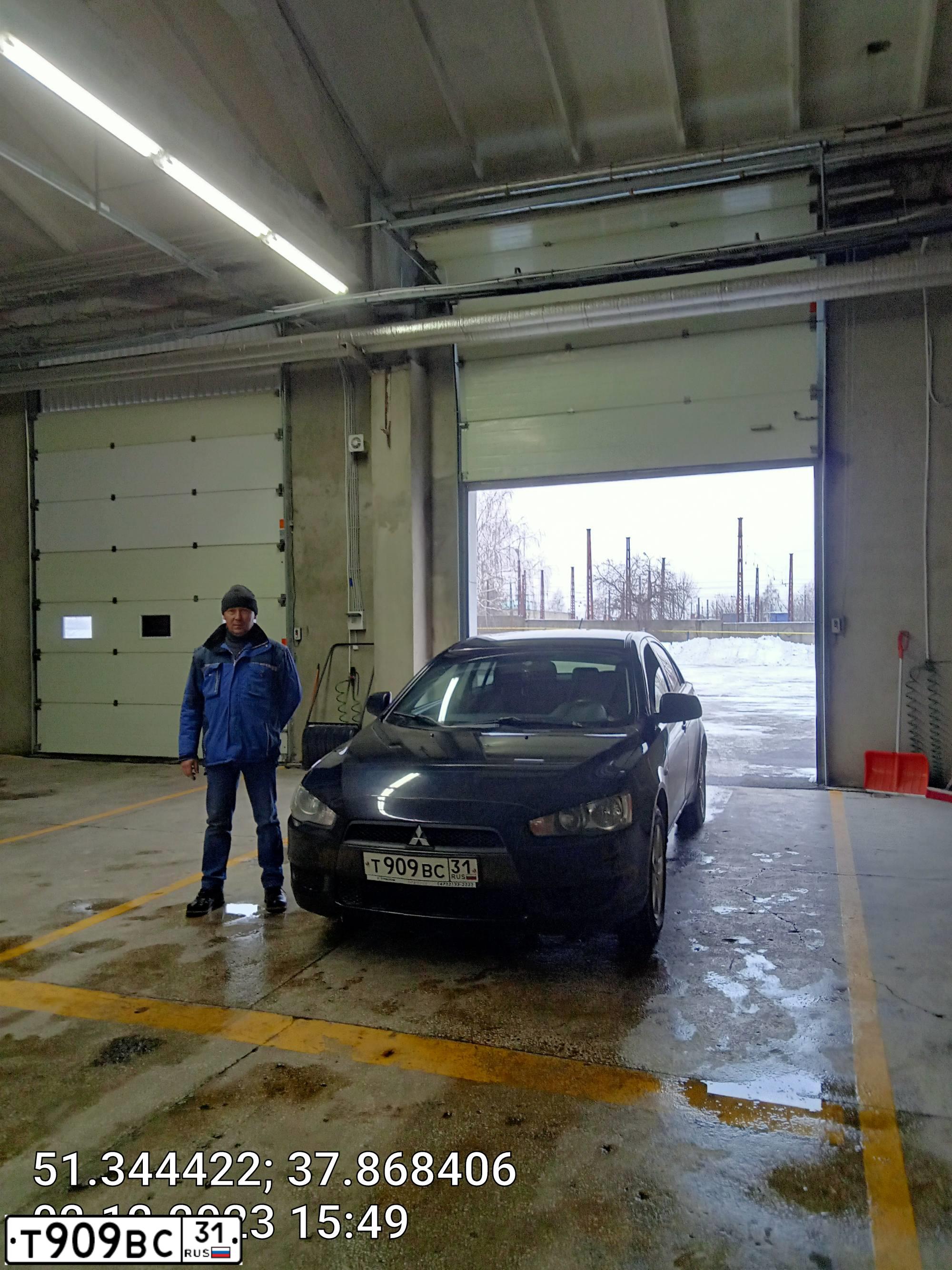 Фото автомобиля MITSUBISHI LANCER, 2008 — госномер Т909ВС31. Цвет: ЧЕРНЫЙ