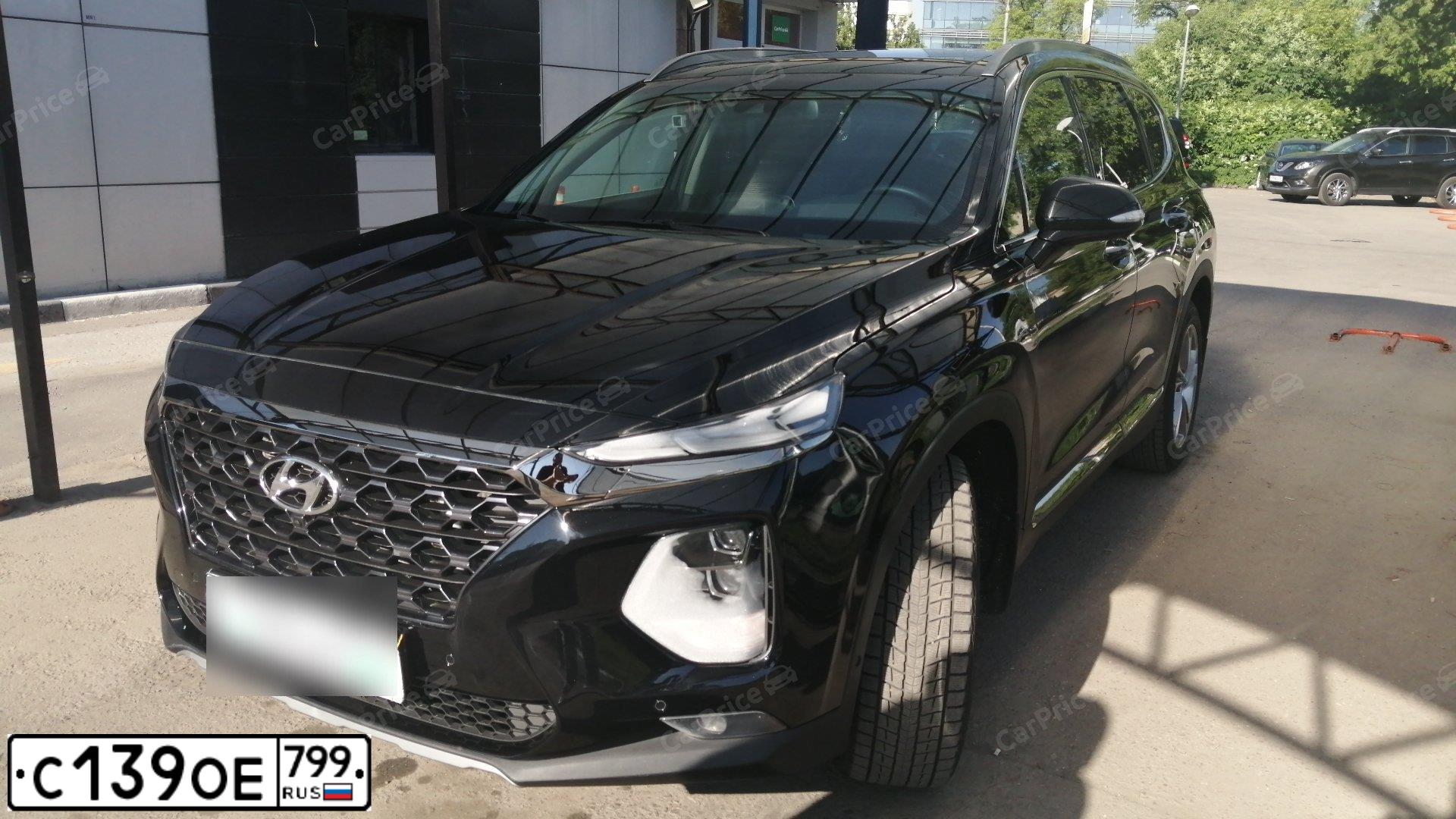 Фото автомобиля ХЕНДЭ SANTA  FE, 2019 — госномер С699ХЕ39. Цвет: ЧЕРНЫЙ