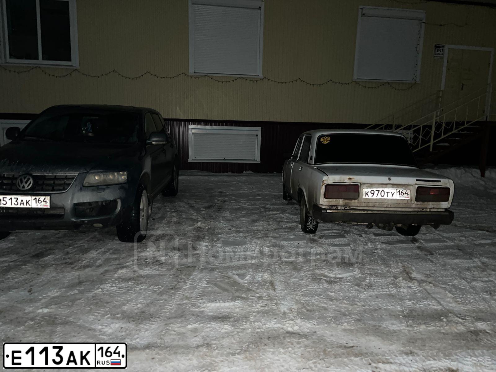 Фото автомобиля MITSUBISHI LANCER, 2008 — госномер Е113АК164. Цвет: ЧЕРНЫЙ