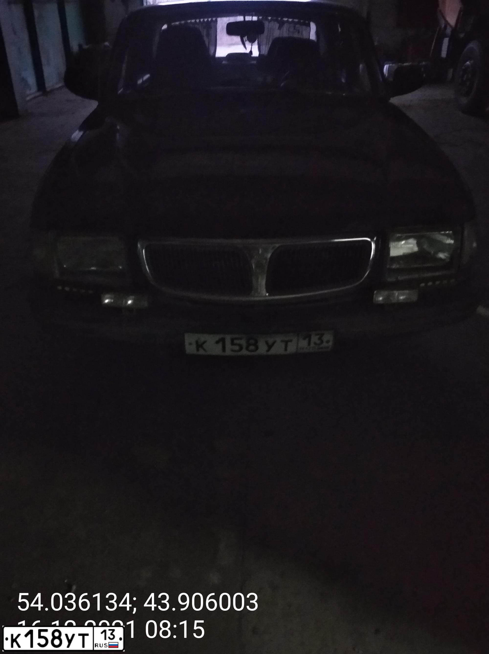 Фото автомобиля GAZ 3110 WOLGA, 1999 — госномер Т952ОМ178. Цвет: ЧЕРНЫЙ