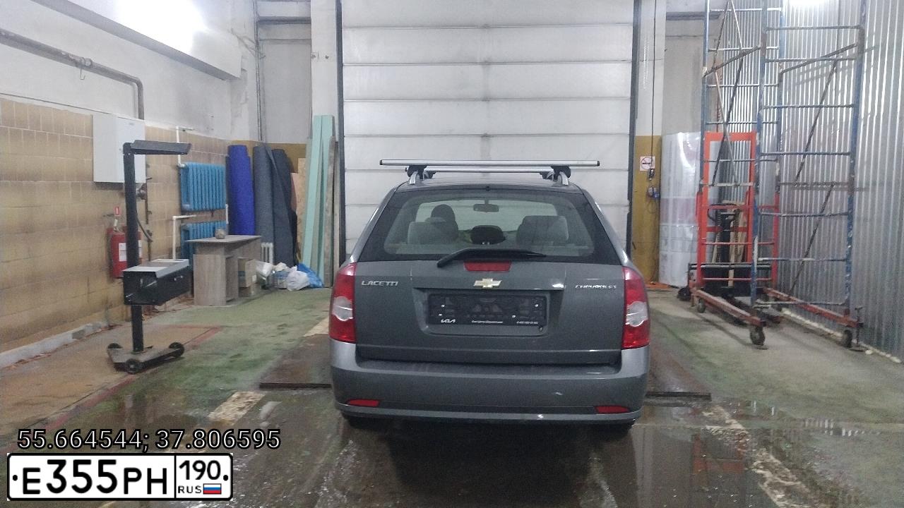 Фото автомобиля CHEVROLET LACETTI, 2012 — госномер Х592ЕВ37. Цвет: Серый