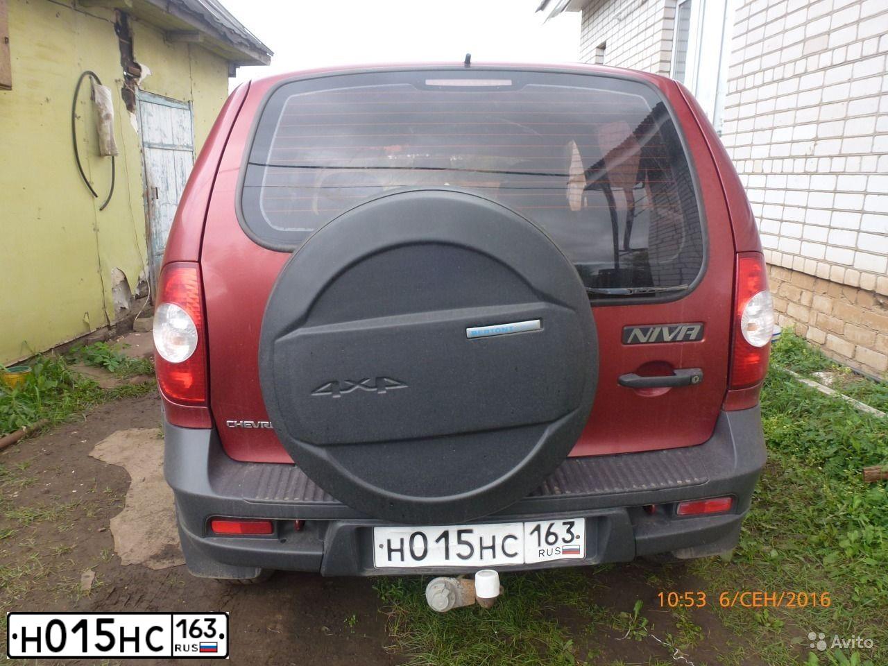 Фото автомобиля CHEVROLET NIVA, 2010 — госномер М235ОТ763. Цвет: ЯРКО КРАСНЫЙ МЕТАЛЛИК