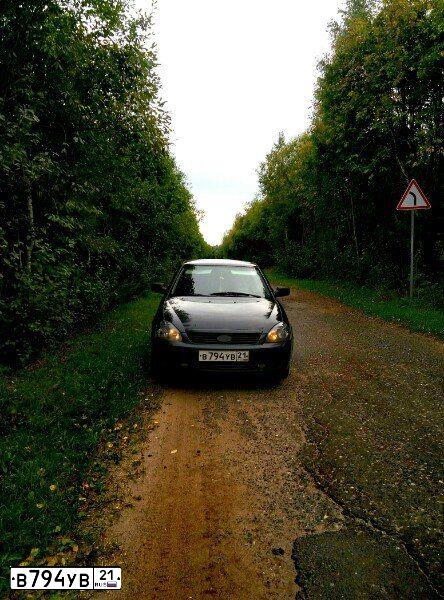 Фото автомобиля LADA 2172 PRIORA, 2008 — госномер А074КМ21. Цвет: Темно-зеленый