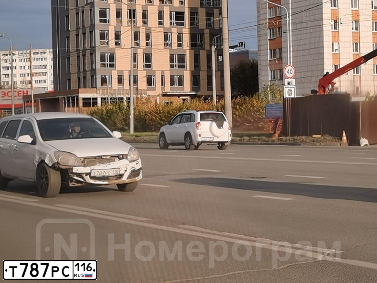 Фото автомобиля OPEL ASTRA, 2013 — госномер Т787РС116. Цвет: БЕЛЫЙ