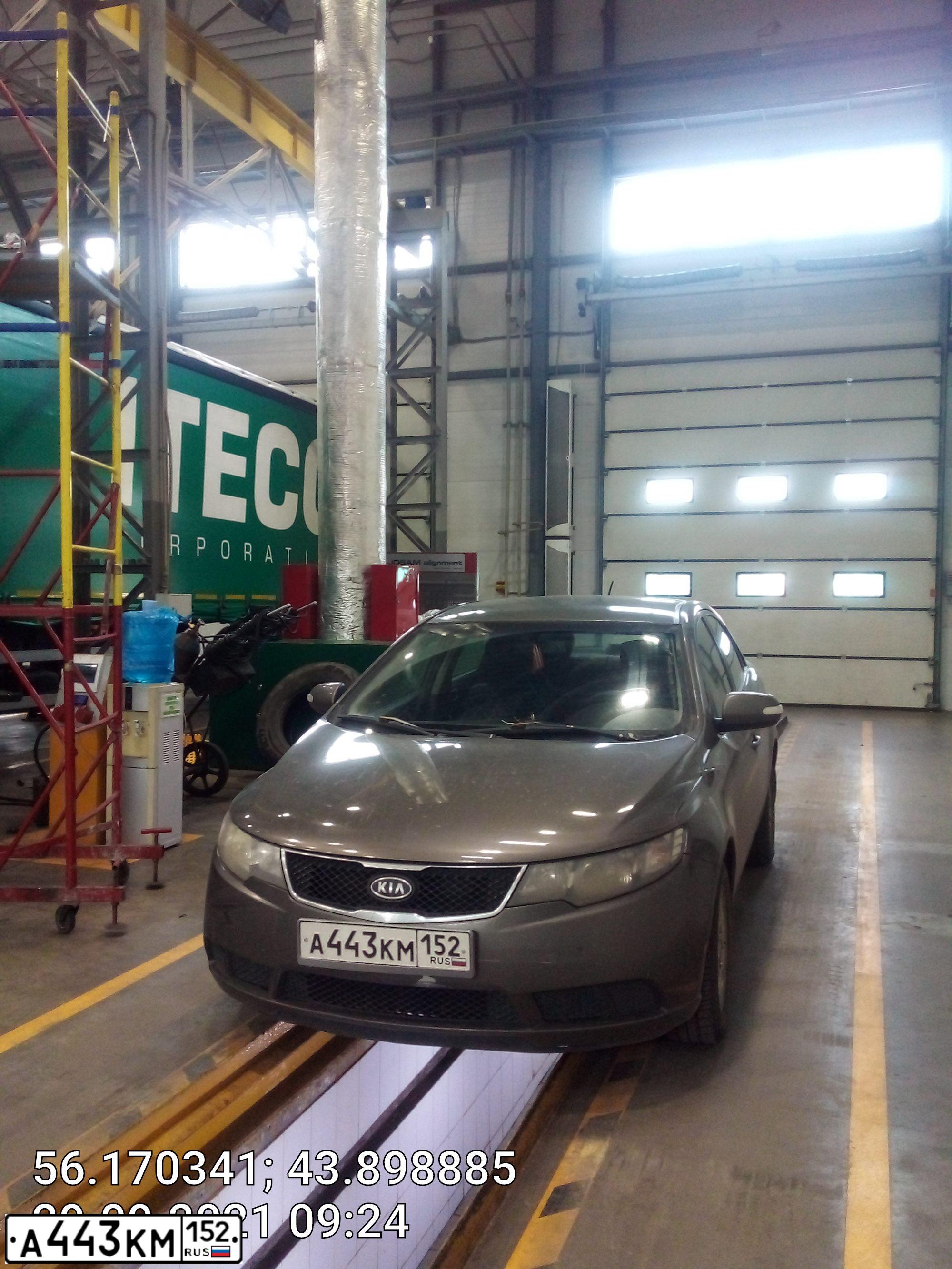 Фото автомобиля KIA CERATO, 2009 — госномер М199ЕР21. Цвет: БРОНЗОВЫЙ