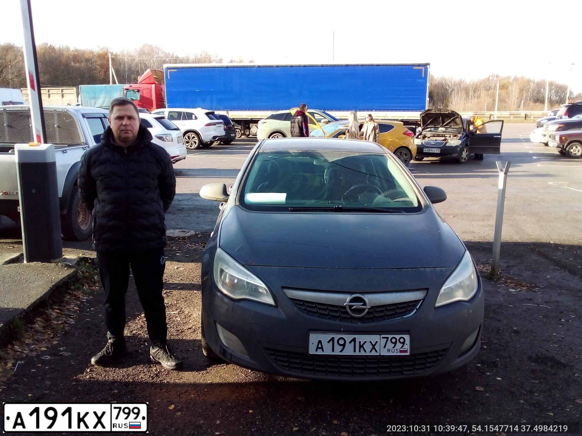 Фото автомобиля OPEL ASTRA, 2012 — госномер Н222ТТ197. Цвет: синий