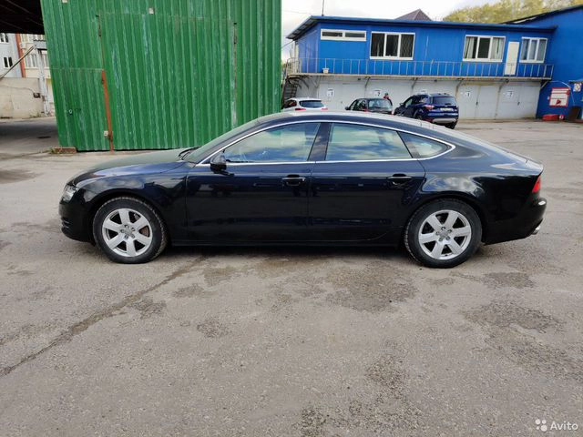 Фото автомобиля AUDI A7, 2011 — госномер В043НР777. Цвет: ЧЕРНЫЙ