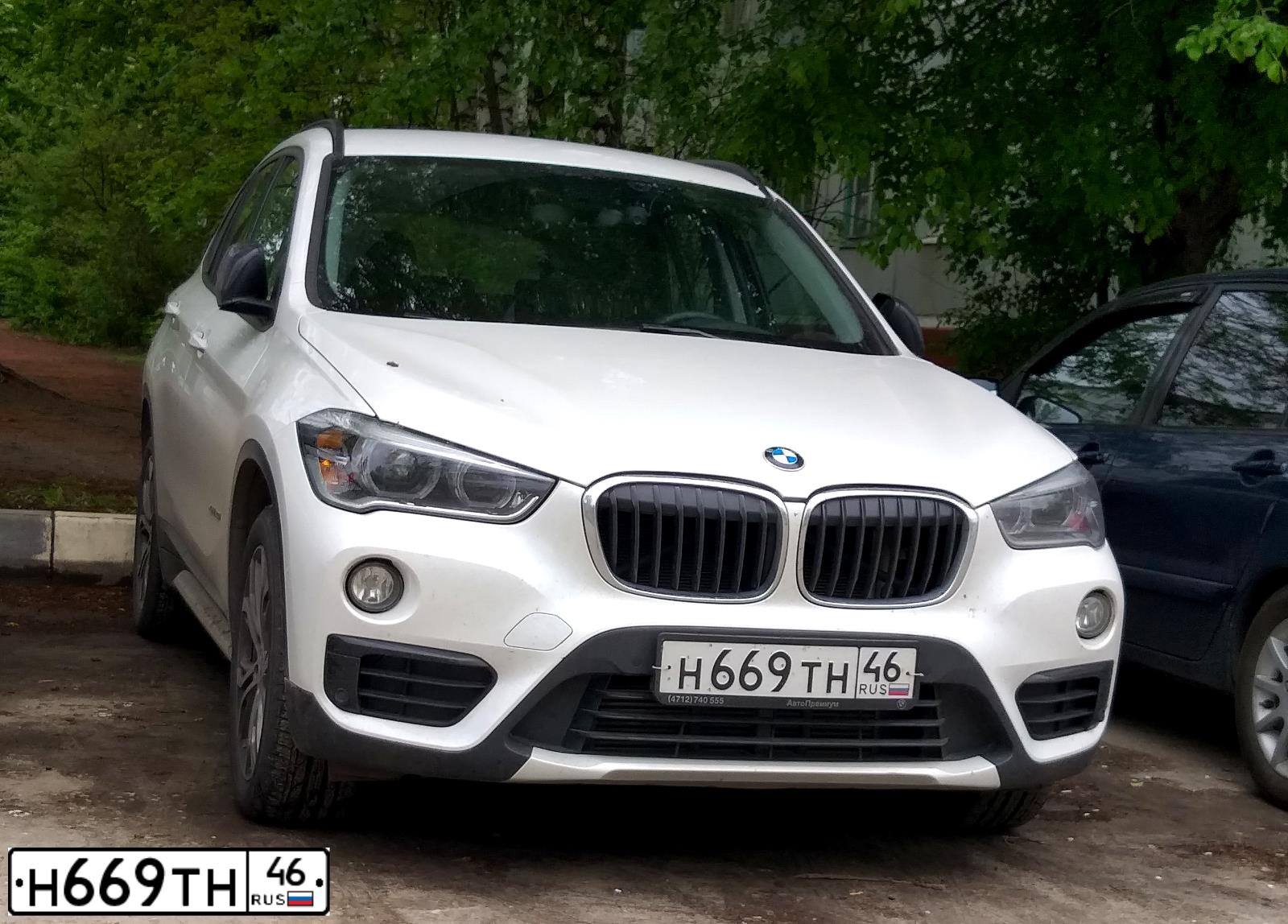 Фото автомобиля BMW X1, 2017 — госномер Н669ТН46. Цвет: БЕЛЫЙ МЕТАЛЛИК