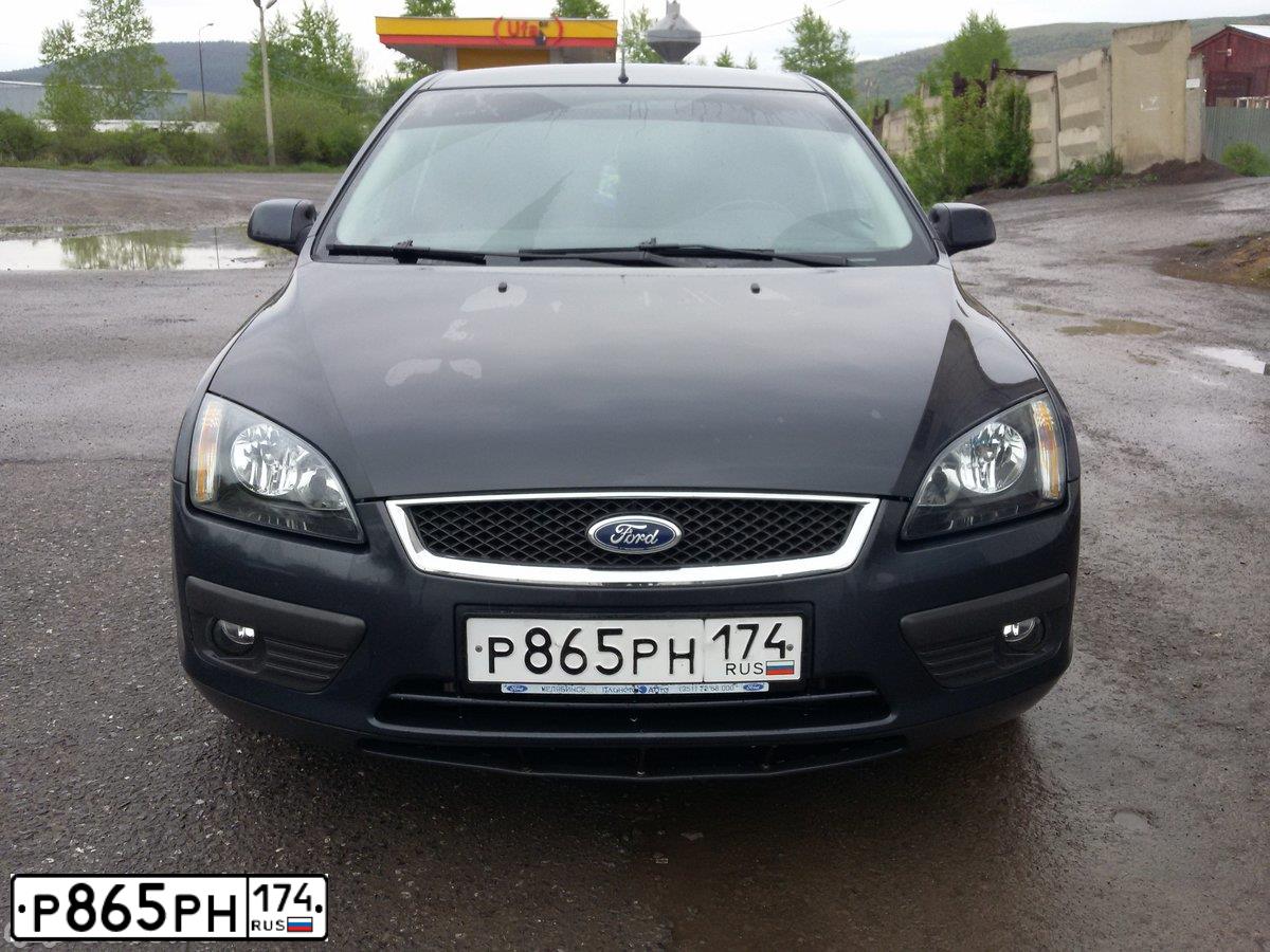 Фото автомобиля FORD FOCUS, 2006 — госномер Р865РН174. Цвет: ТЕМНО-СЕРЫЙ