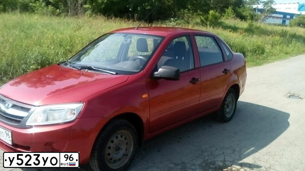 Фото автомобиля LADA 2190 GRANTA, 2012 — госномер В200МР45. Цвет: Красный