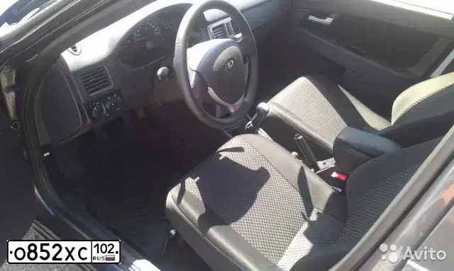 Фото автомобиля LADA 2172 PRIORA, 2013 — госномер М115ХА702. Цвет: серебристо-темно-серый