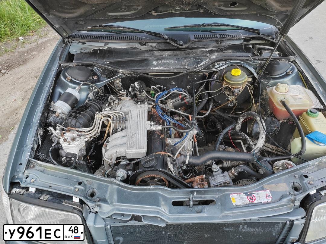 Фото автомобиля AUDI 100, 1991 — госномер Х284УА36. Цвет: СЕРО-ГОЛУБОЙ