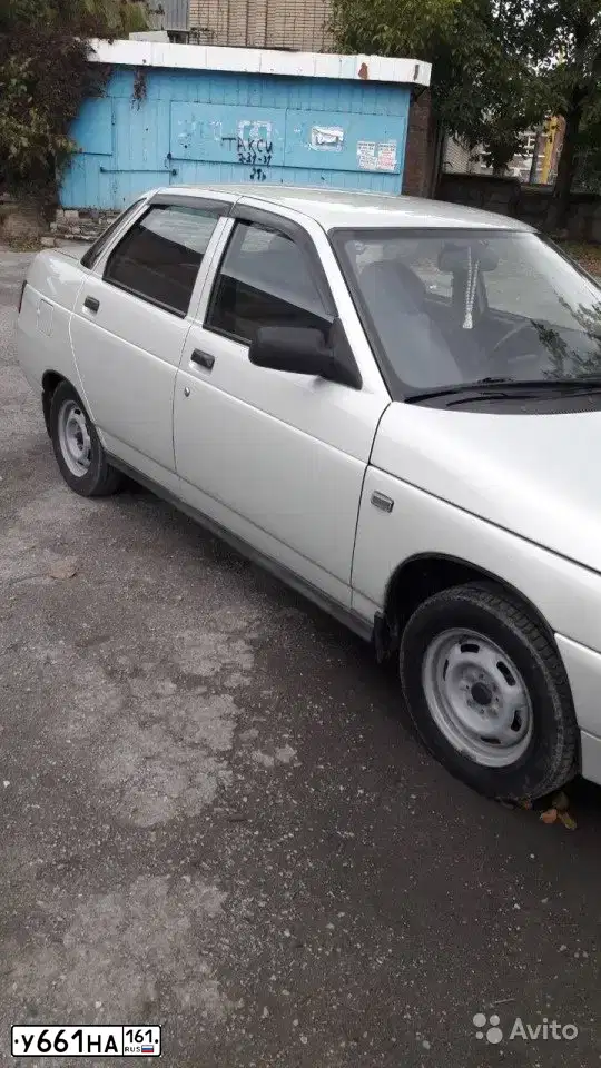 Фото автомобиля LADA 2110, 2004 — госномер К019СР53. Цвет: МОЛОЧНО-БЕЛЫЙ СЕРЕБРИСТЫЙ