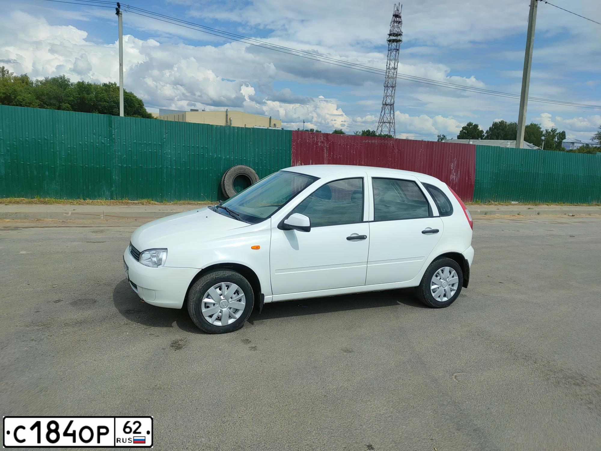 Фото автомобиля LADA 1119 KALINA, 2010 — госномер С184ОР62. Цвет: Белый