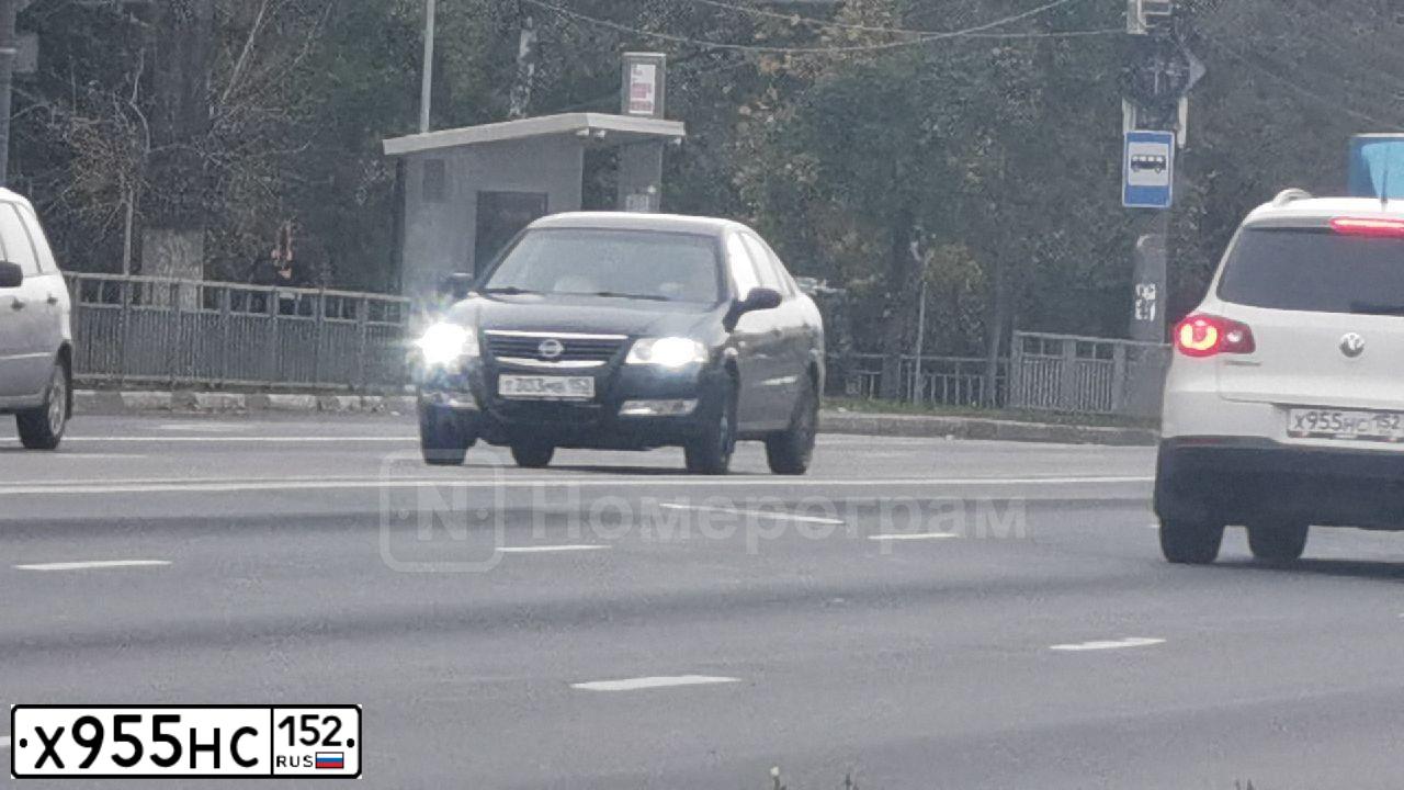 Фото автомобиля VOLKSWAGEN TIGUAN, 2010 — госномер Х955НС152. Цвет: Белый