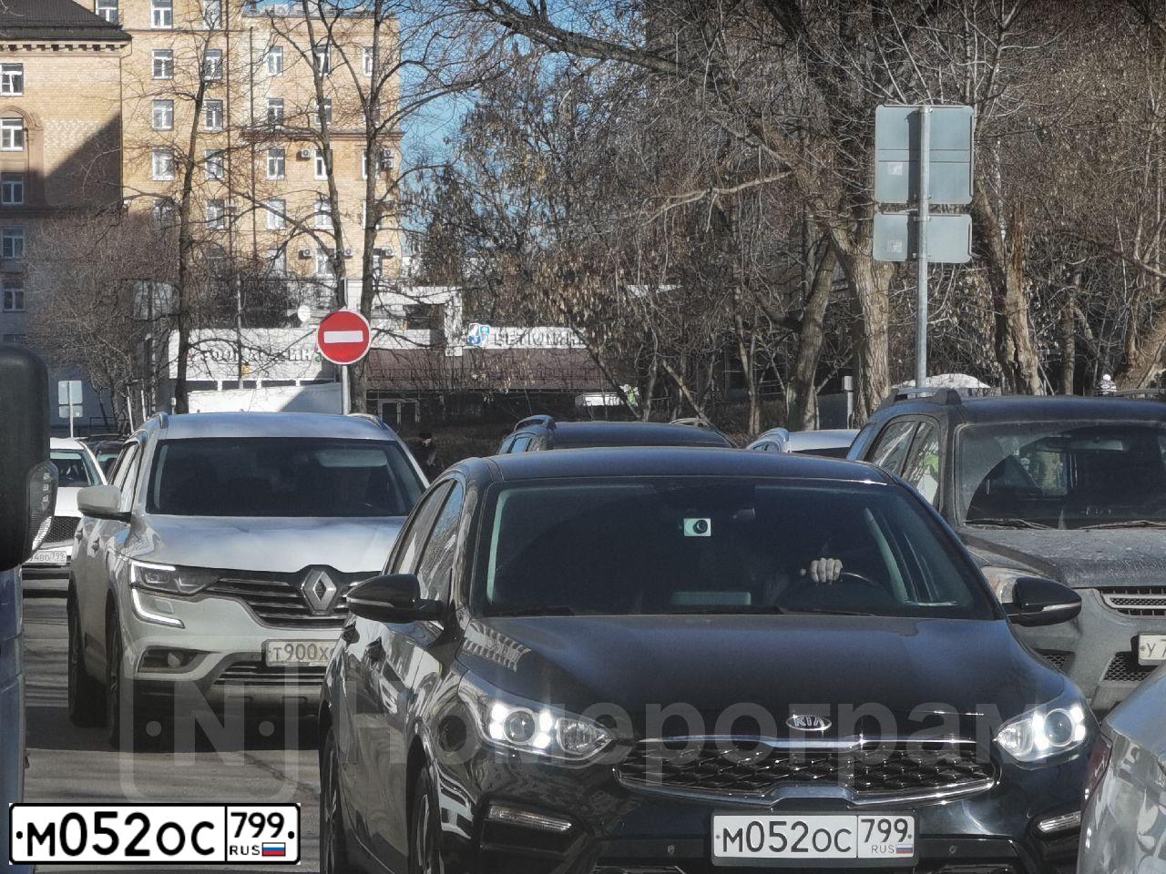 Фото автомобиля KIA CERATO, 2019 — госномер М052ОС799. Цвет: ЧЕРНЫЙ