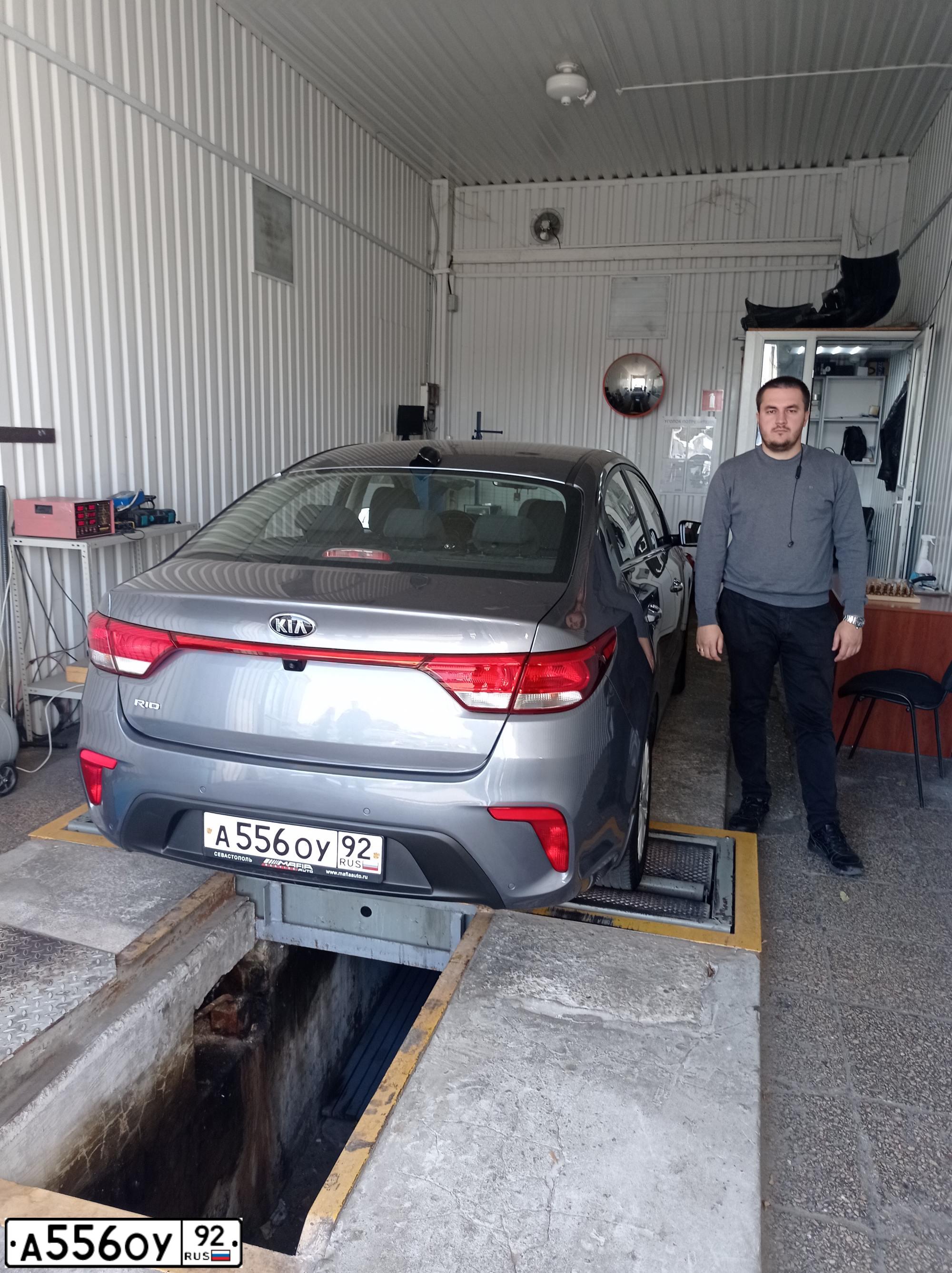 Фото автомобиля КИА РИО, 2018 — госномер М957ТС82. Цвет: Серый