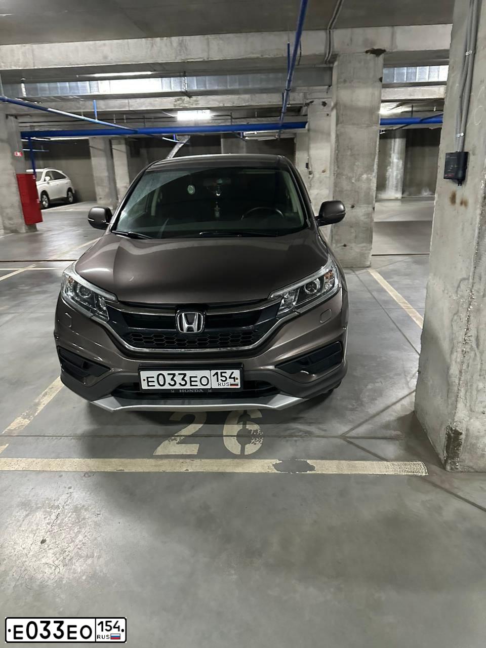 Фото автомобиля HONDA CR-V, 2015 — госномер Е033ЕО154. Цвет: СЕРО-КОРИЧНЕВЫЙ МЕТАЛЛ