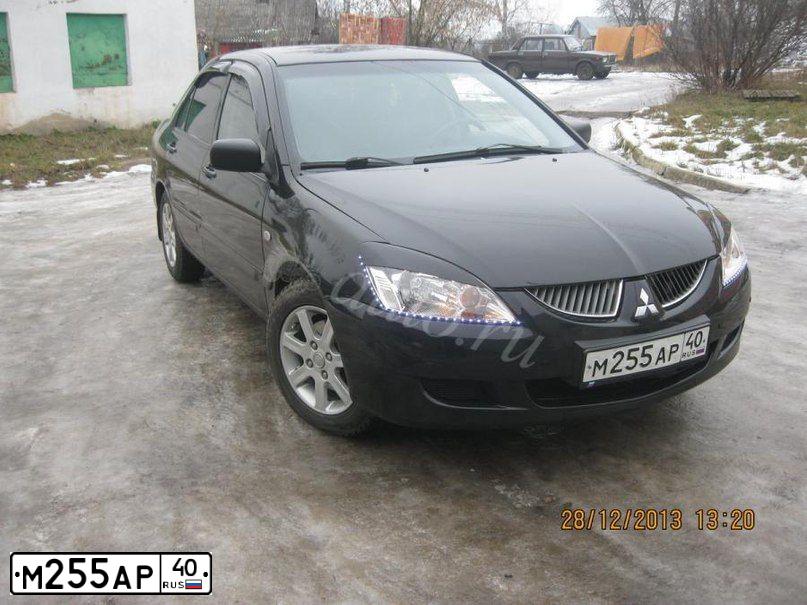 Фото автомобиля MITSUBISHI LANCER, 2004 — госномер Е790НО67