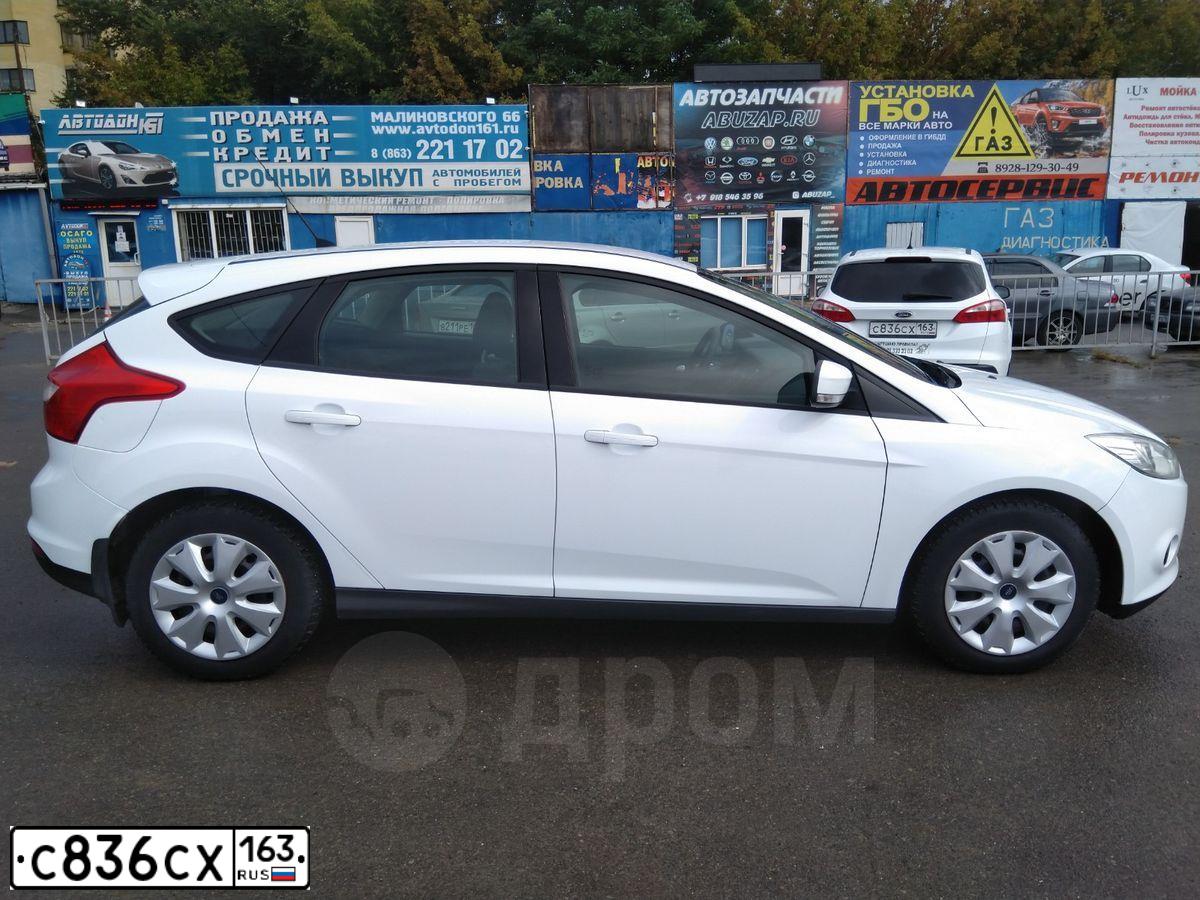 Фото автомобиля FORD FOCUS, 2013 — госномер М124ТА134. Цвет: Белый