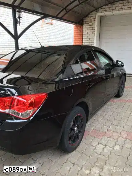 Фото автомобиля CHEVROLET CRUZE, 2011 — госномер У039ЕС977. Цвет: ЧЕРНЫЙ МЕТАЛЛИК