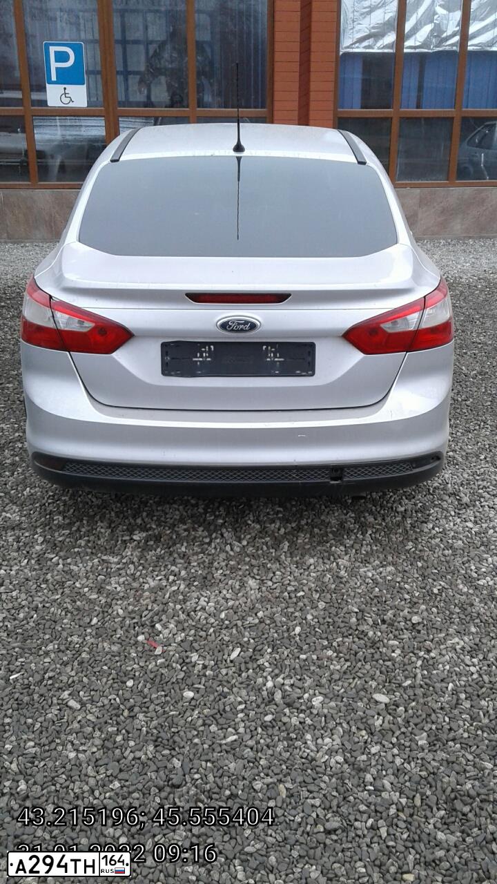 Фото автомобиля FORD FOCUS, 2011 — госномер Х222УМ64. Цвет: СЕРЕБРИСТЫЙ