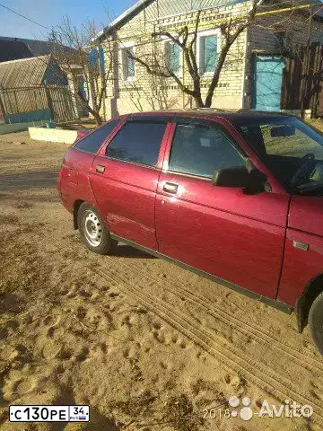 Фото автомобиля LADA 2112, 2004 — госномер С130РЕ34. Цвет: ТЕМНО-МАЛИНОВЫЙ