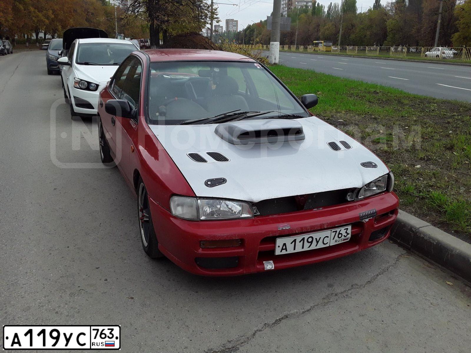 Фото автомобиля SUBARU IMPREZA, 1998 — госномер А119УС763. Цвет: Красный