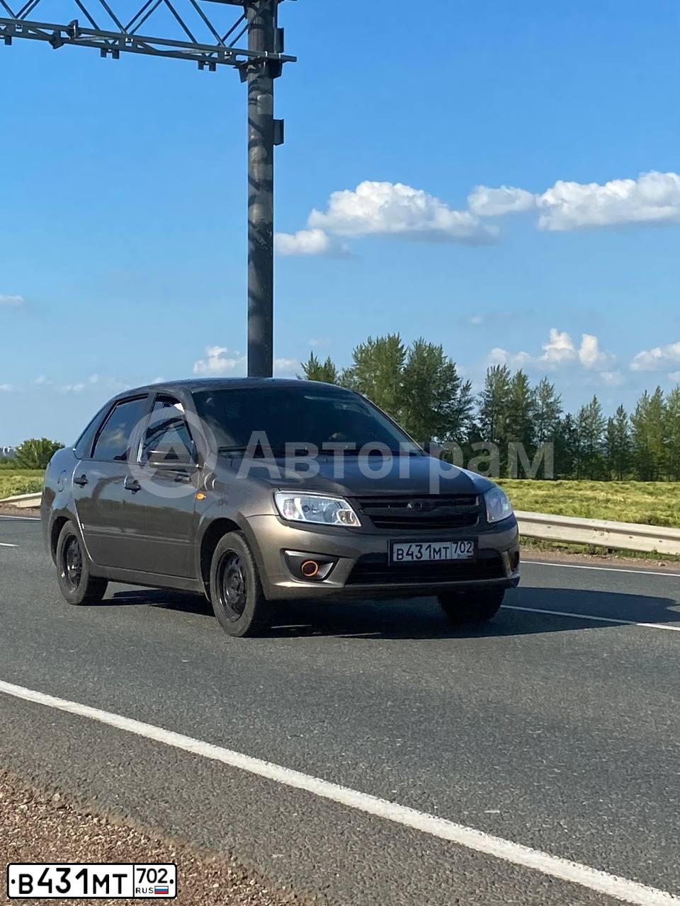 Фото автомобиля LADA 2190 GRANTA, 2017 — госномер В431МТ702. Цвет: Золотисто-коричневый